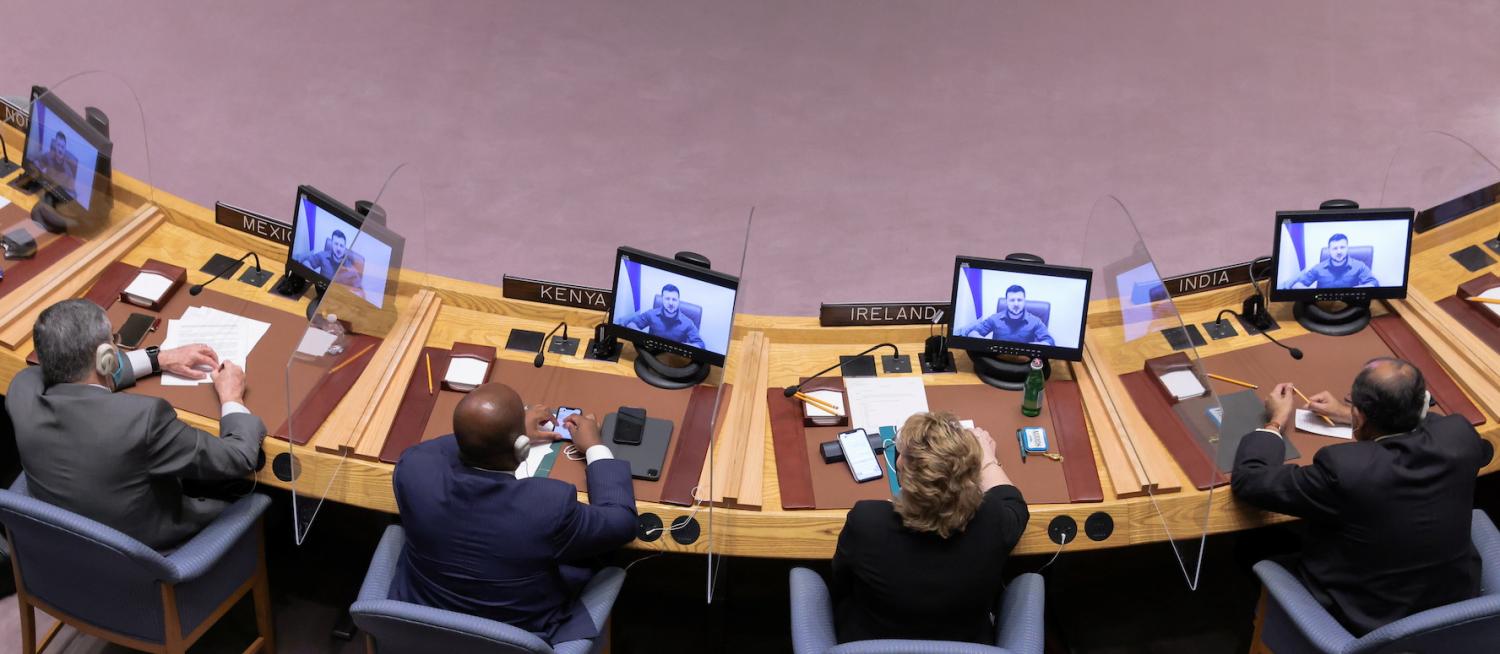 United Nations Security Council members watch as Ukrainian President Volodymyr Zelenskyy, who appears on their screens, addresses the council via video link during a meeting amid Russia's invasion of Ukraine, at the United Nations Headquarters in Manhattan, New York City, New York, U.S., April 5, 2022.