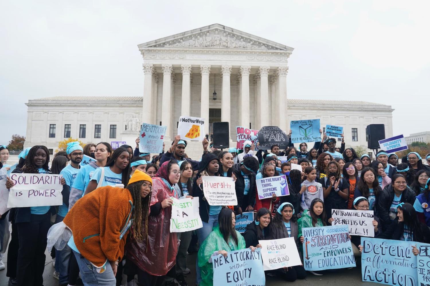 Oct. 31, 2022; Washington, DC, USA; Protestors gather outside as the U.S. Supreme Courts hears oral arguments in two affirmative action college admission cases on October 31, 2022. The two lawsuits from Students for Fair Admissions, an anti-affirmative action group founded by conservative legal strategist Edward Blum, accuse the University of North Carolina and Harvard of discriminating against Asian American students and giving unfair preference to Black and Hispanic applicants challenging decades of legal precedent. In the lawsuit against UNC, the group says the school also discriminated against white applicants. Mandatory Credit: Jack Gruber-USA TODAY