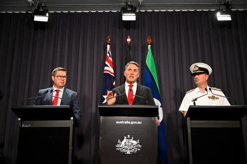 (L-R) Australian Defence Industry Minister Pat Conroy, Australian Deputy Prime Minister Richard Marles and head of the Nuclear Powered Submarine Task Force Vice Admiral Jonathan Mead speak to the media during a press conference at Parliament House in Canberra, Tuesday, March 14, 2023. Prime Minister Anthony Albanese will outline Australia's plan to acquire nuclear submarines alongside US President Joe Biden and UK Prime Minister Rishi Sunak. (AAP Image/Lukas Coch) NO ARCHIVINGNo Use Australia. No Use New Zealand.
