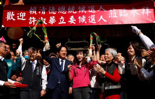 Lai Ching-te, Taiwan's vice president and the ruling Democratic Progressive Party's presidential candidate poses for a group photo during an election campaign event in Taipei, Taiwan, December 7, 2023. REUTERS/Ann Wang