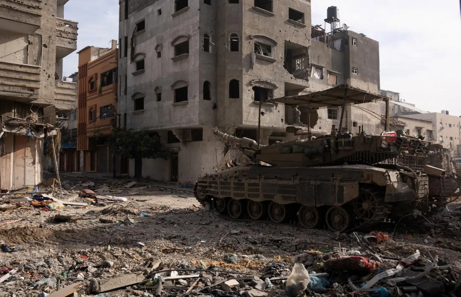 A Merkava tank is seen as Israeli soldiers operate in the Gaza Strip amid the ongoing conflict between Israel and the Palestinian Islamist group Hamas, in this handout picture released on December 17, 2023.