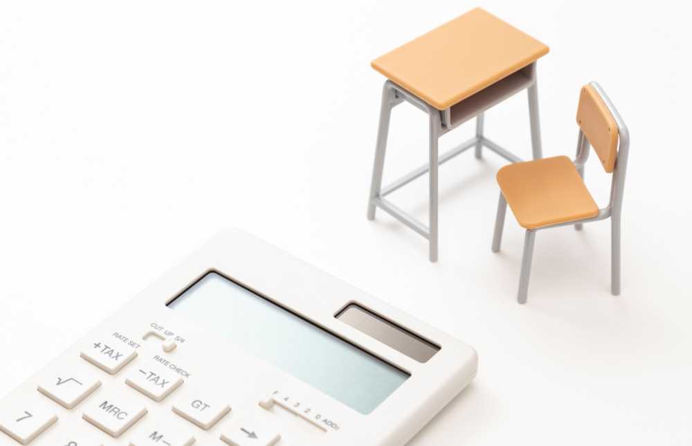 school desk and chair with calculator