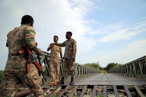 Members of Amhara special forces stand guard on the Tekeze river bridge near Ethiopia-Eritrean border near the town of Humera, Ethiopia July 1, 2021.