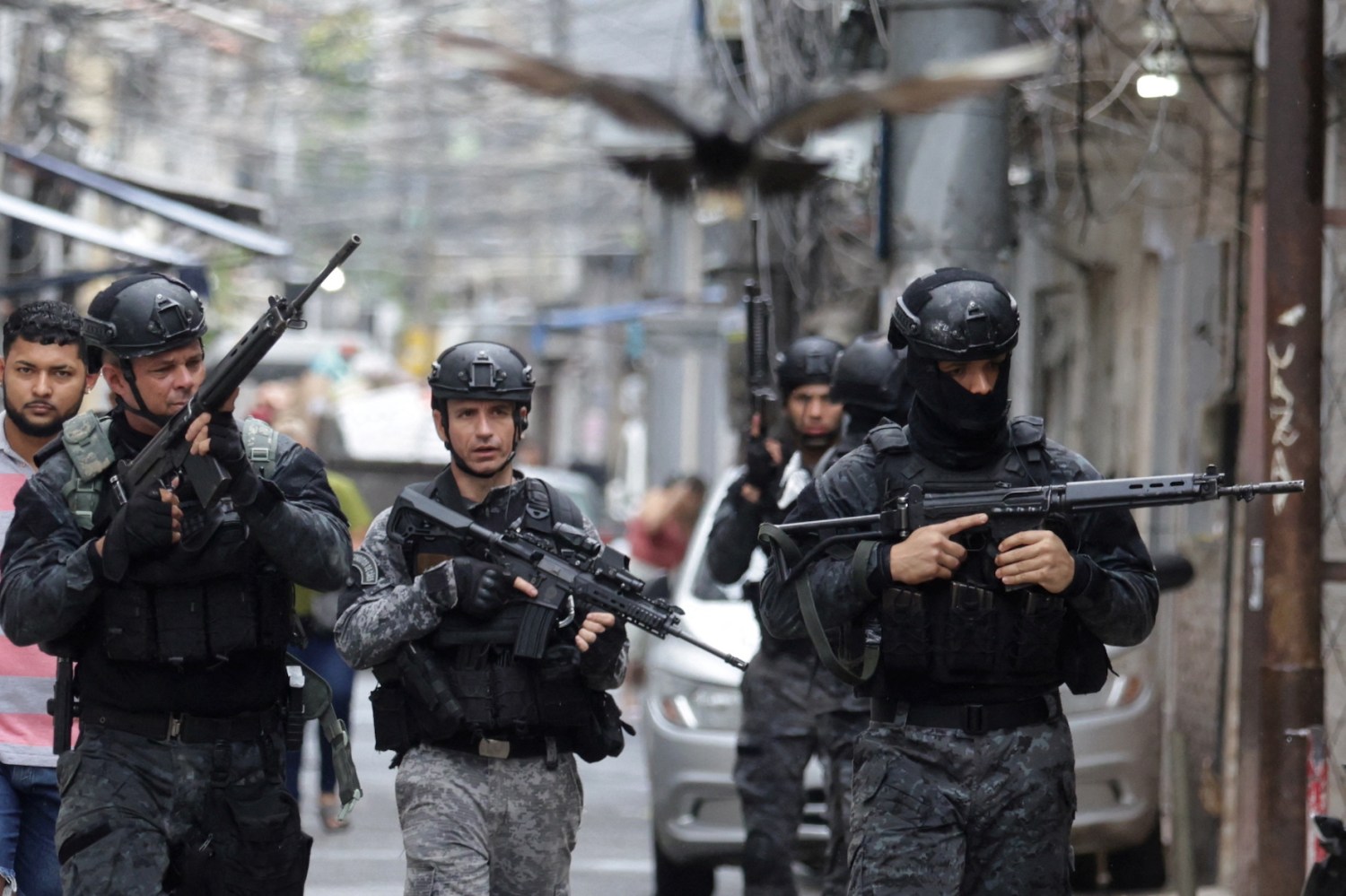 Police officers patrol the favelas Mare complex, during an anti-crime operation in Rio de Janeiro, Brazil, October 9, 2023.