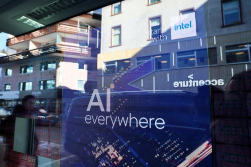 A slogan related to Artificial Intelligence (AI) is displayed on a screen in Intel pavilion, during the 54th annual meeting of the World Economic Forum in Davos, Switzerland, January 16, 2024. REUTERS/Denis Balibouse