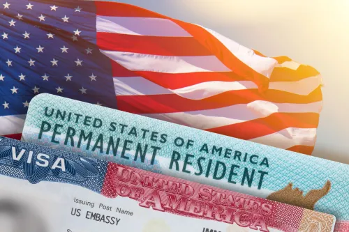 American flag with green card and visa