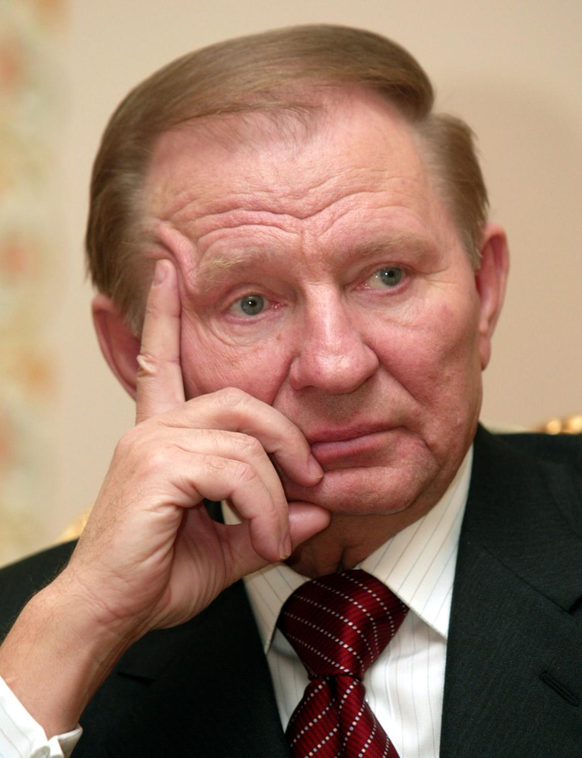 Ukrainian President Leonid Kuchma looks on during a meeting with Russian leader Vladimir Putin in Novo-Ogaryovo residence outside Moscow, March 17, 2004.