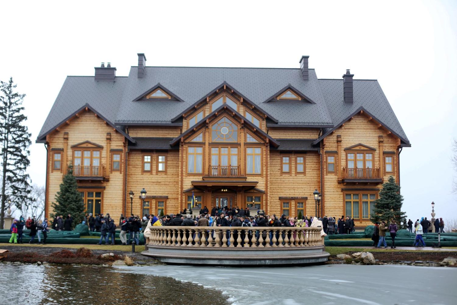 People visit President Viktor Yanukovych's Mezhyhirya estate, which was abandoned by security, on February 22, 2014 in Kyiv, Ukraine.