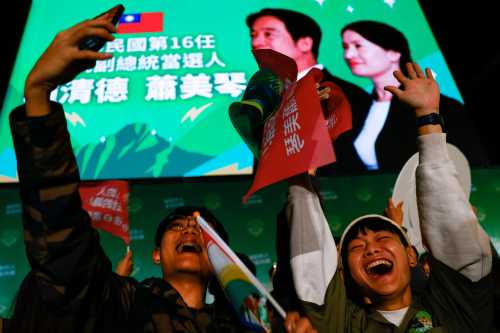 Supporters of the Democratic Progressive Party (DPP) celebrate during a rally, following the victory of Lai Ching-te in the presidential elections, in Taipei, Taiwan, January 13, 2024.