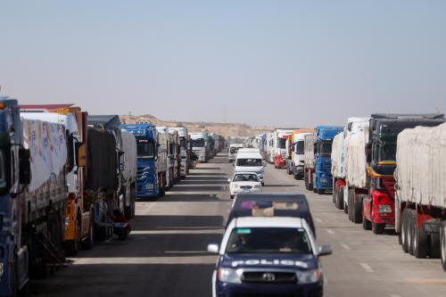 Trucks carrying aid line up near the Rafah border crossing between Egypt and the Gaza Strip, amid the ongoing conflict between Israel and Palestinian Islamist group Hamas, in Rafah, Egypt, February 1, 2024. REUTERS/Mohamed Abd El Ghany