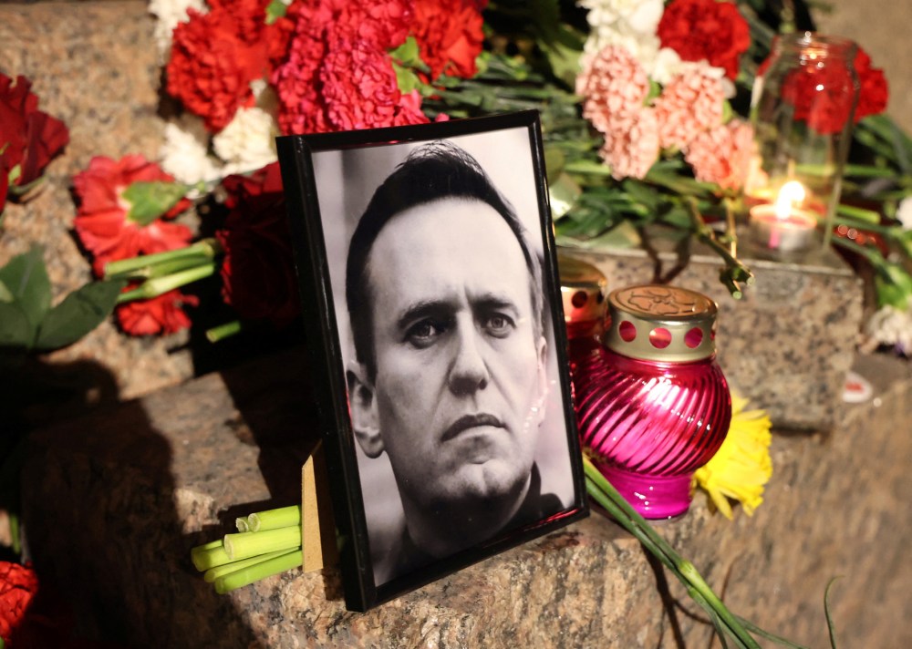 A portrait of Russian opposition leader Alexei Navalny is placed at the monument to the victims of political repressions following Navalny's death, in Saint Petersburg, Russia February 16, 2024.