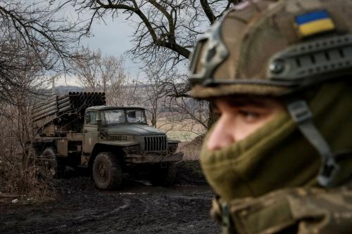 A Ukrainian serviceman looks on next to a BM-21 Grad multiple launch rocket system near a frontline, amid Russia's attack on Ukraine, at an undisclosed location in the Donetsk region, Ukraine February 4, 2024.