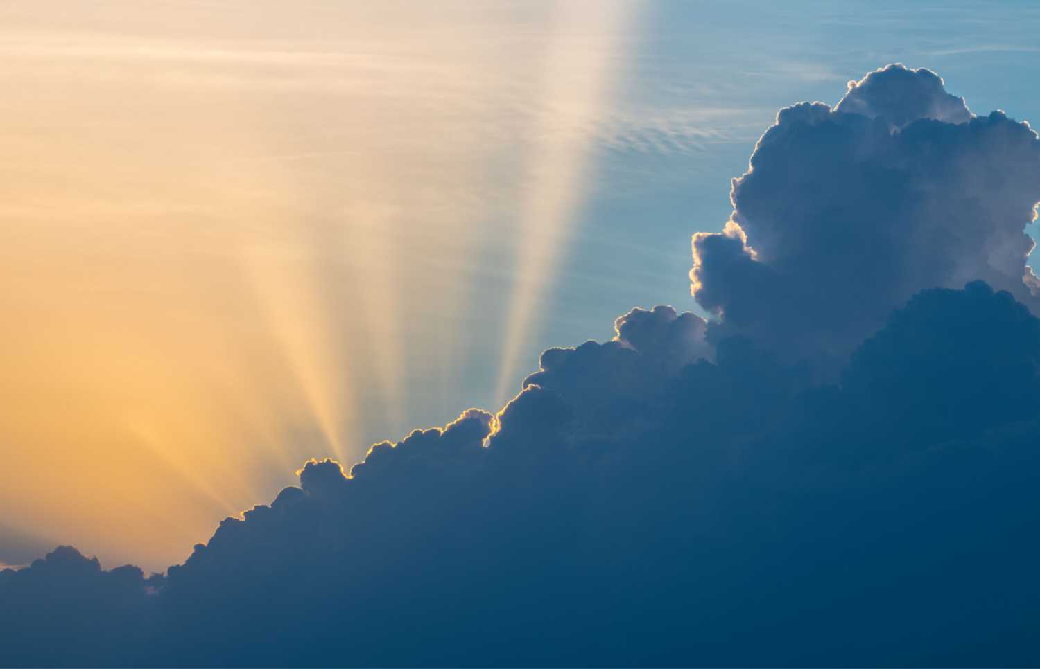 Sunshine comes out from behind a cloud, climate tax