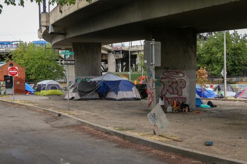 Portland, Oregon, USA, August 8th 2023: Homeless encampment under the SE Morrison Bridge in downtown Portland Oregon
