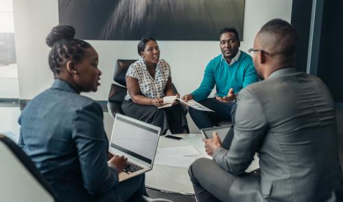 Team,Of,African,Bussines,People,Debating,During,A,Work,Meeting.