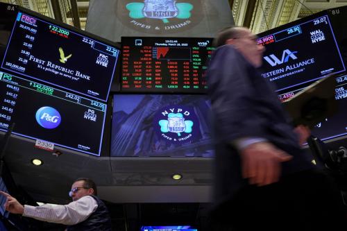 Traders work at the post where First Republic Bank stock is traded on the floor of the New York Stock Exchange (NYSE) in New York City, U.S., March 16, 2023.