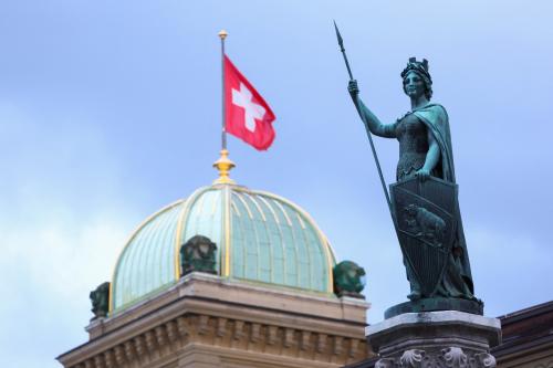 The Helvetia statue is pictured in front of the Swiss Parliament Building, in Bern, Switzerland, March 19, 2023. REUTERS/Denis Balibouse