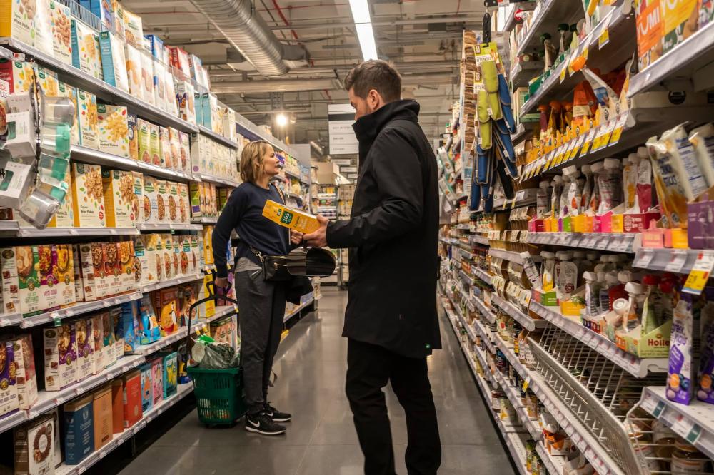 Shopping in a Whole Foods Market supermarket in New York on Friday, March 22, 2024.
