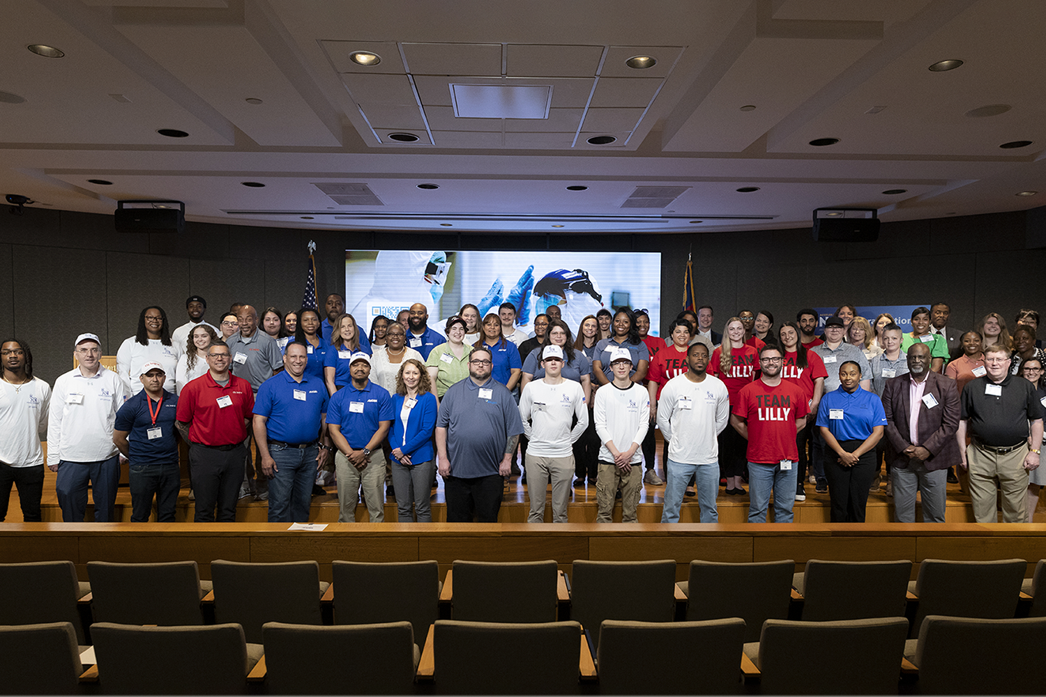 May 2024 Career Celebration for recent training participants now in life sciences manufacturing careers.(in front of Accelerate NC banner)