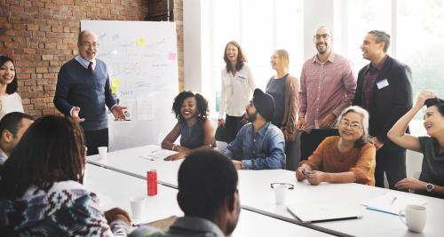 Employees engaged in a group discussion