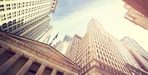 skyward photo of banks on Wall Street