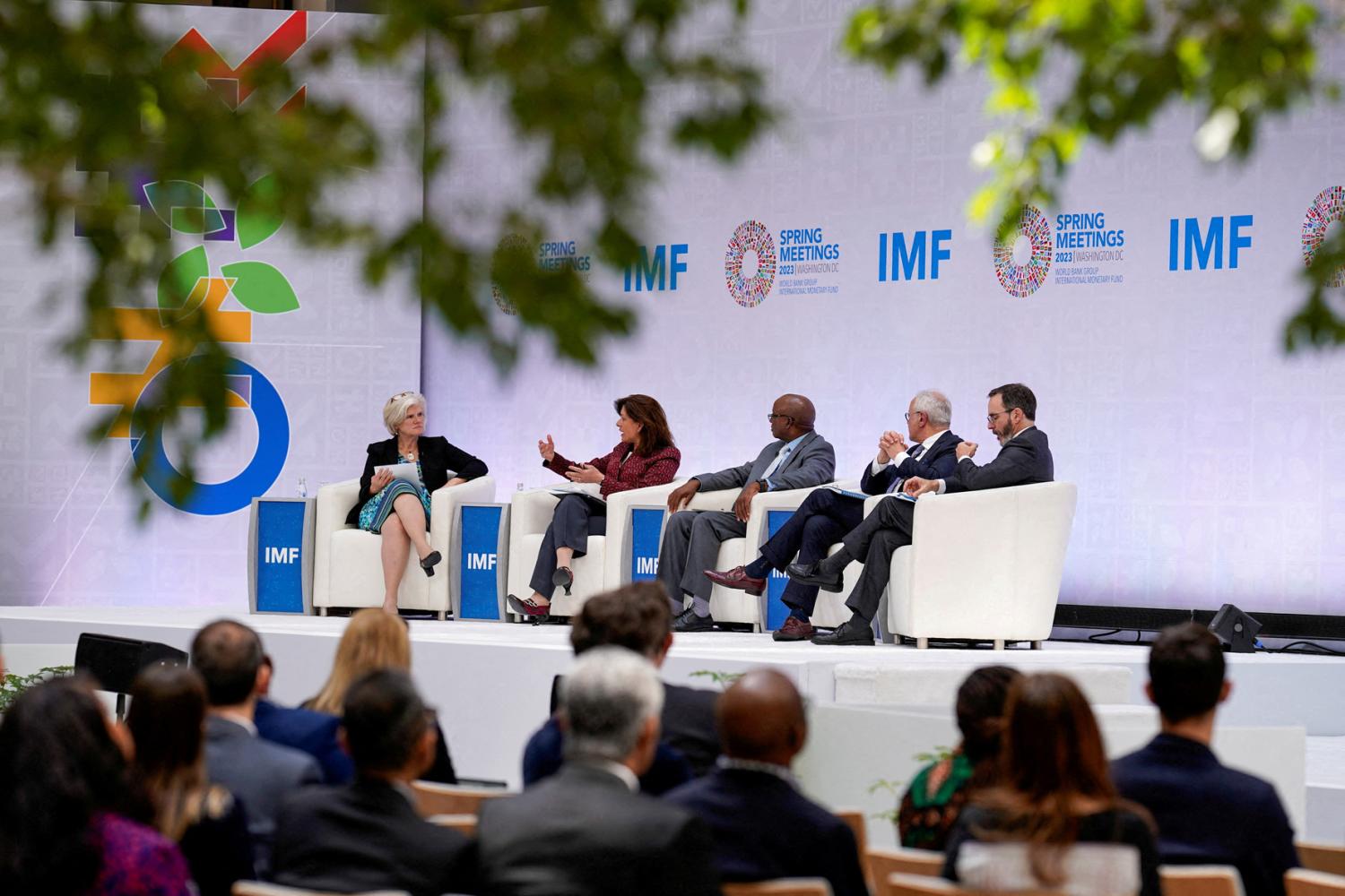 Reuters journalist Andrea Shalal moderates an International Monetary Fund (IMF) roundtable on tackling public debt with IMF Director for the Strategy, Policy, and Review Department Ceyla Pazarbasioglu; Zambian Secretary of Treasury Felix Nkulukusa; Head of Cabinet of the European Commission Marco Buti; and IMF Director and Economic Counsellor Pierre-Olivier Gourinchas during IMF Spring Meetings at the International Monetary Fund Building in Washington, DC, United States, April 12, 2023. Reuters/Ken Cedeno/File Photo