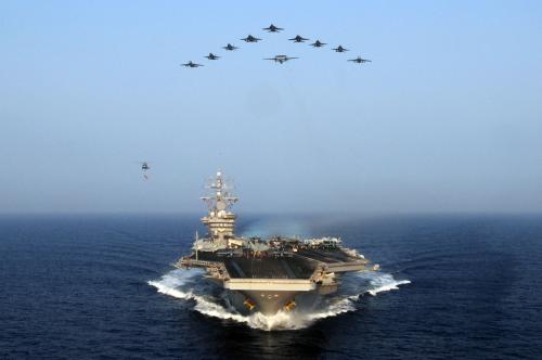 Handout photo dated July 10, 2012 shows aircraft from Carrier Air Wing 7 fly over the Nimitz-class aircraft carrier USS Dwight D. Eisenhower (CVN 69) in the Mediterranean Sea. The USS Dwight Eisenhower aircraft carrier has reportedly sailed north through the Red Sea toward Israel in a show of deterrence from the Biden administration.