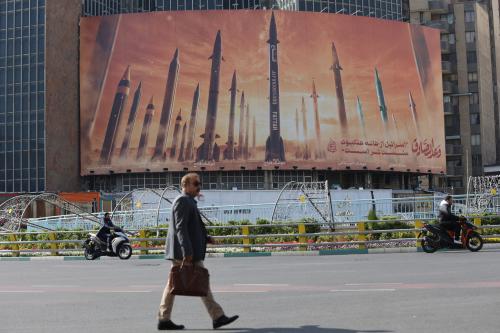 An anti-Israel billboard with a picture of Iranian missiles is seen in a street in Tehran, Iran, April 15, 2024.