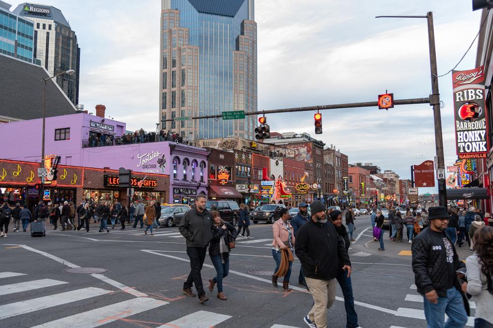 Nashville, Tennessee: January 2, 2020: Nashville's Broadway, which offers live music in neon-decorated buildings. Nashville is the capital of Tennessee.