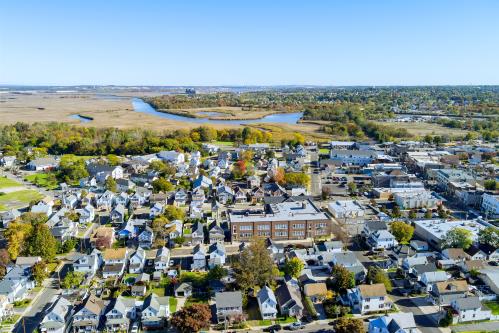 Landscape of small rural American town in New Jersey consists of private houses at countryside