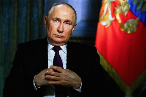 Russian President Vladimir Putin gives an interview to TV presenter Dmitry Kiselyov (not pictured) on screen that Moscow is ready to use nuclear weapons if there is a threat to the existence of the Russian state, but "there has never been such a need".