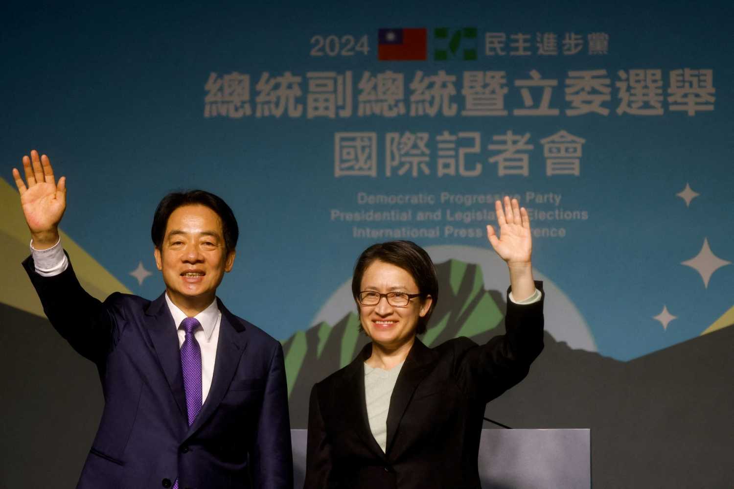 Taiwan President-elect Lai Ching-te, of Democratic Progressive Party's (DPP) and his running mate Hsiao Bi-khim wave as they hold a press conference, following the victory in the presidential elections, in Taipei, Taiwan January 13, 2024.