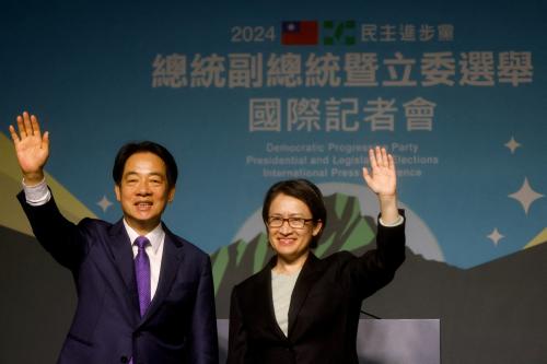 Taiwan President-elect Lai Ching-te, of Democratic Progressive Party's (DPP) and his running mate Hsiao Bi-khim wave as they hold a press conference, following the victory in the presidential elections, in Taipei, Taiwan January 13, 2024.
