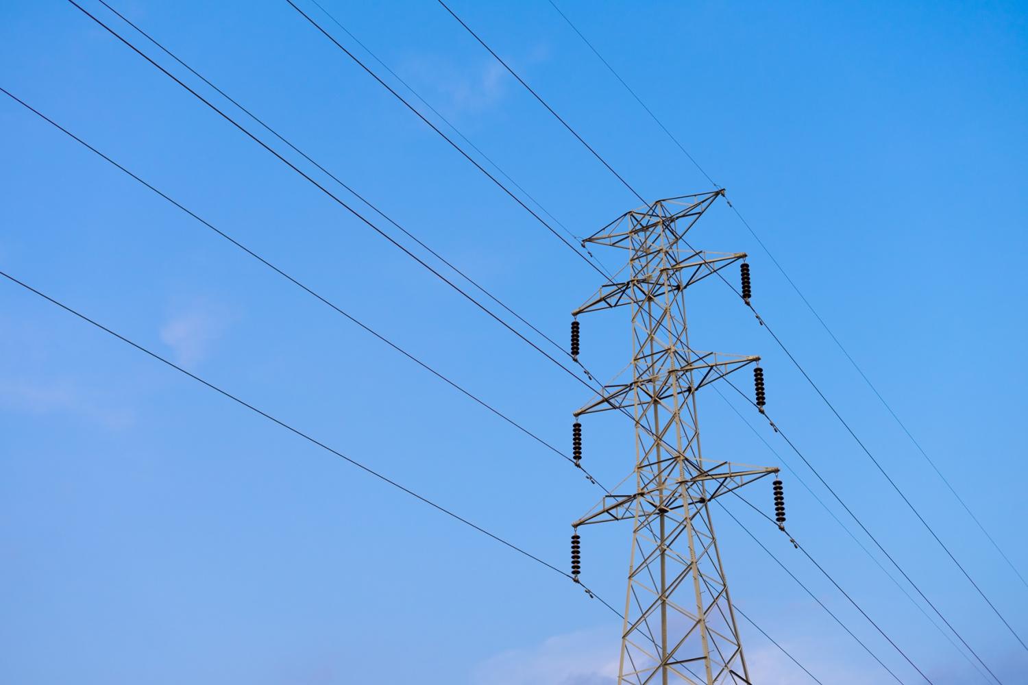 Power lines representing the electric grid and clean energy transition