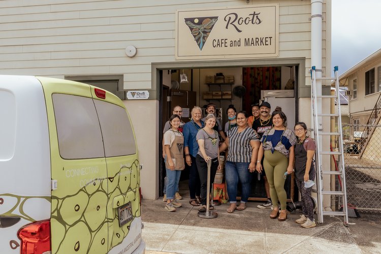 Staff at the Roots Café and Market – a food hub that supports small and micro-producers to sell their healthy food products from the KKV Wellness Center to provide healthy options like free-range eggs, fresh poi, local fish, breadfruit, kalo, cassava, banana, and leafy greens to the Kalihi community Credit: Kaʻōhua Lucas
