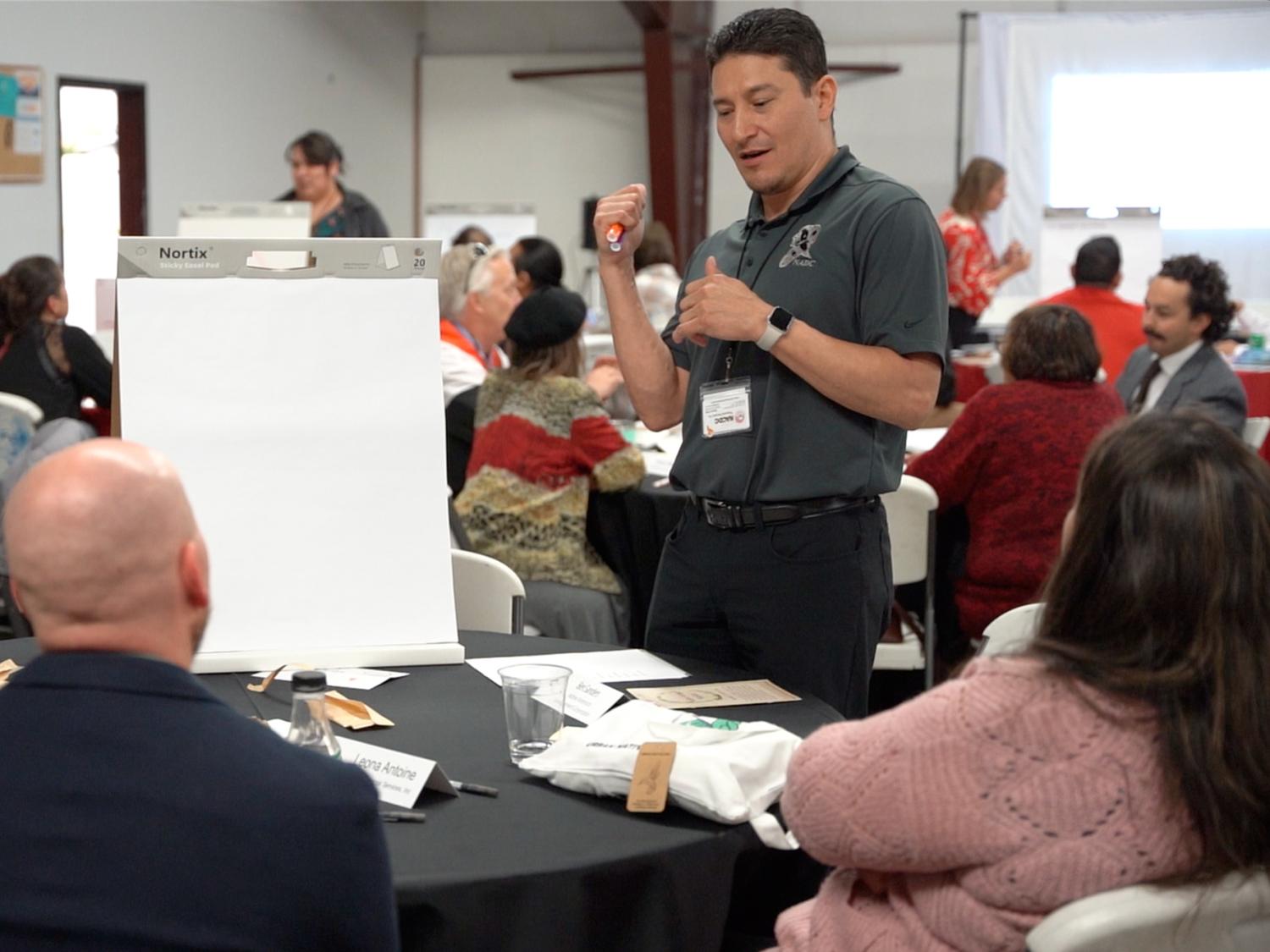 Ben Sanders, Chief Financial Officer of NADC, leads a discussion with a small group on myth busting Native access to capital at the Mountain | Plains Indigenous Finance Gathering at Blackfeet Nation, Montana.