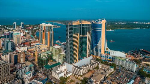 Overhead view of tall buildings near the sea