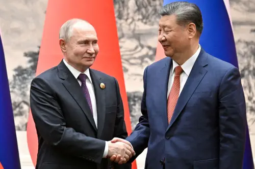 FILE PHOTO: Russian President Vladimir Putin shakes hands with Chinese President Xi Jinping during a meeting in Beijing, China May 16, 2024. Sputnik/Sergei Bobylev/Pool via REUTERS