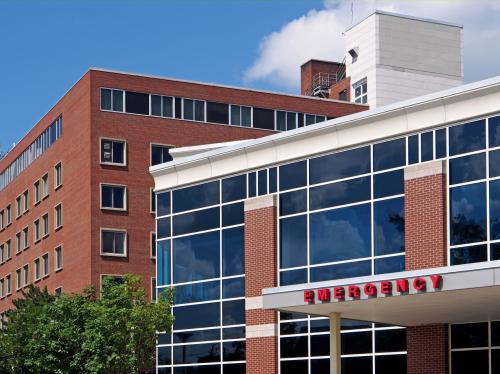 Exterior of a hospital building on a sunny day