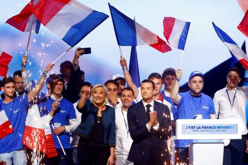 FILE PHOTO: Marine Le Pen, President of the French far-right National Rally (Rassemblement National - RN) party parliamentary group, and Jordan Bardella, President of the French far-right National Rally (Rassemblement National - RN) party and head of the RN list for the European elections, attend a political rally during the party's campaign for the EU elections, in Paris, France, June 2, 2024. REUTERS/Christian Hartmann/File Photo