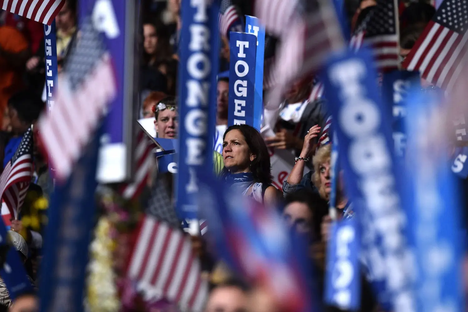 Delegates hold up signs during Democratic presidential nominee Hillary Clinton speech on the fourth and final day of the 2016 Democratic National Convention at the Wells Fargo Center in Philadelphia, PA, on July 28, 2016.