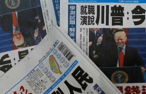 Copies of Taiwanese daily newspaper Liberty Times, with its frontpage on the inauguration of U.S. President Donald Trump, are seen a printing house in Taipei, Taiwan January 21, 2017.