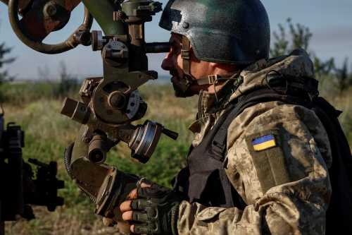 A Ukrainian serviceman of the 110th Colonel-General Marko Bezruchko Separate Mechanized Brigade prepares to fire an RM-70 Vampire multiple launch rocket system toward Russian troops, amid Russia's attack on Ukraine, at a position near a front line in Donetsk region, Ukraine, June 30, 2024.