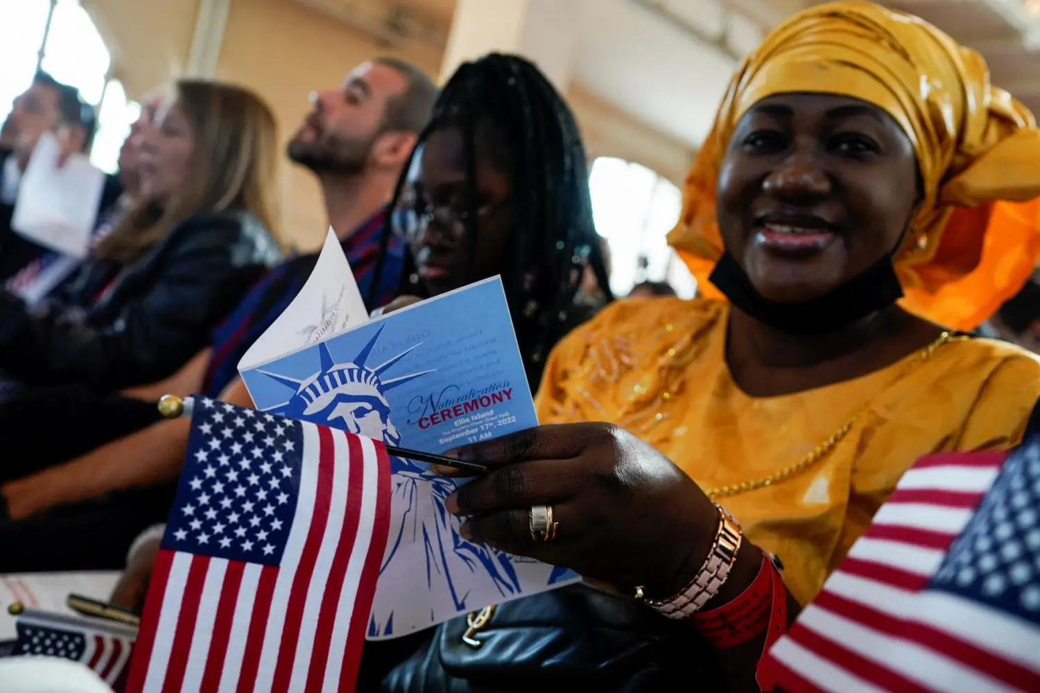People attend a naturalization ceremony at Ellis Island in New York, U.S., September 17, 2022.