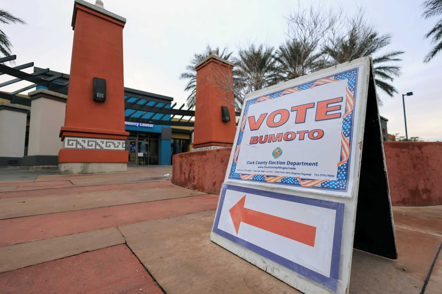 A sign directs voters towards the polling station during the state's Democratic and Republican presidential primary election, held two days before a competing Republican presidential caucus, in Las Vegas, Nevada, U.S. February 6, 2024.
