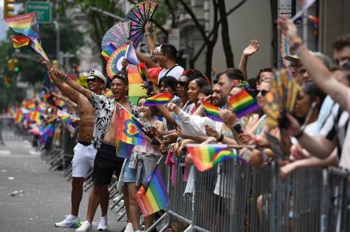 People watch the New York City Pride March along 5th Avenue, New York, NY, June 30, 2024.