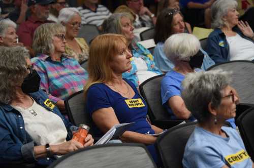People in favor of election certification attend the Washoe County Commissioners meeting in Reno on July 16, 2024.