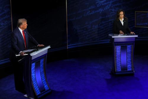 Democratic presidential nominee, U.S. Vice President Kamala Harris speaks during a presidential debate hosted by ABC as Republican presidential nominee, former U.S. President Donald Trump listens, in Philadelphia, Pennsylvania, U.S., September 10, 2024.