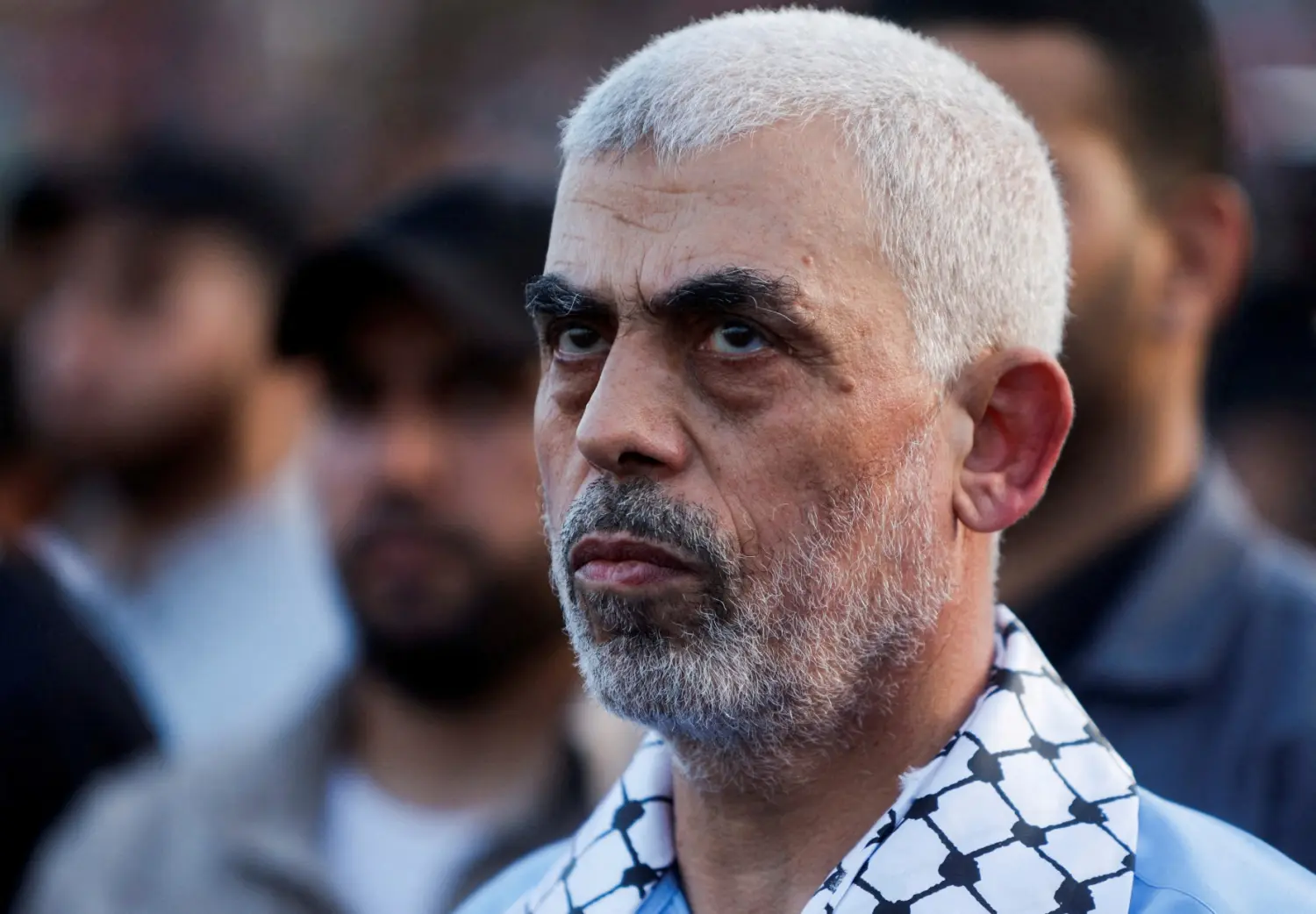 Hamas leader Yahya Sinwar looks on as Palestinian Hamas supporters take part in an anti-Israel rally over tension in Jerusalem's Al-Aqsa mosque, in Gaza City October 1, 2022.