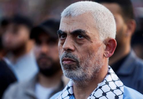 Hamas leader Yahya Sinwar looks on as Palestinian Hamas supporters take part in an anti-Israel rally over tension in Jerusalem's Al-Aqsa mosque, in Gaza City October 1, 2022.